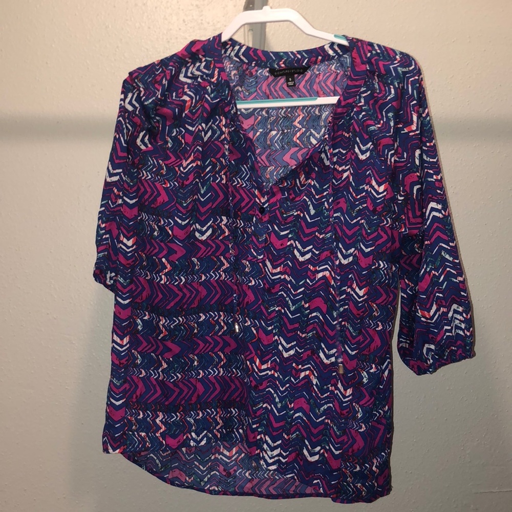 Small rainbow print shirt.
